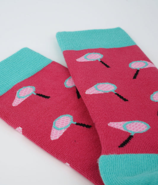 Chaussettes fantaisie en coton biologique roses et turquoise avec motif d'épuisettes.