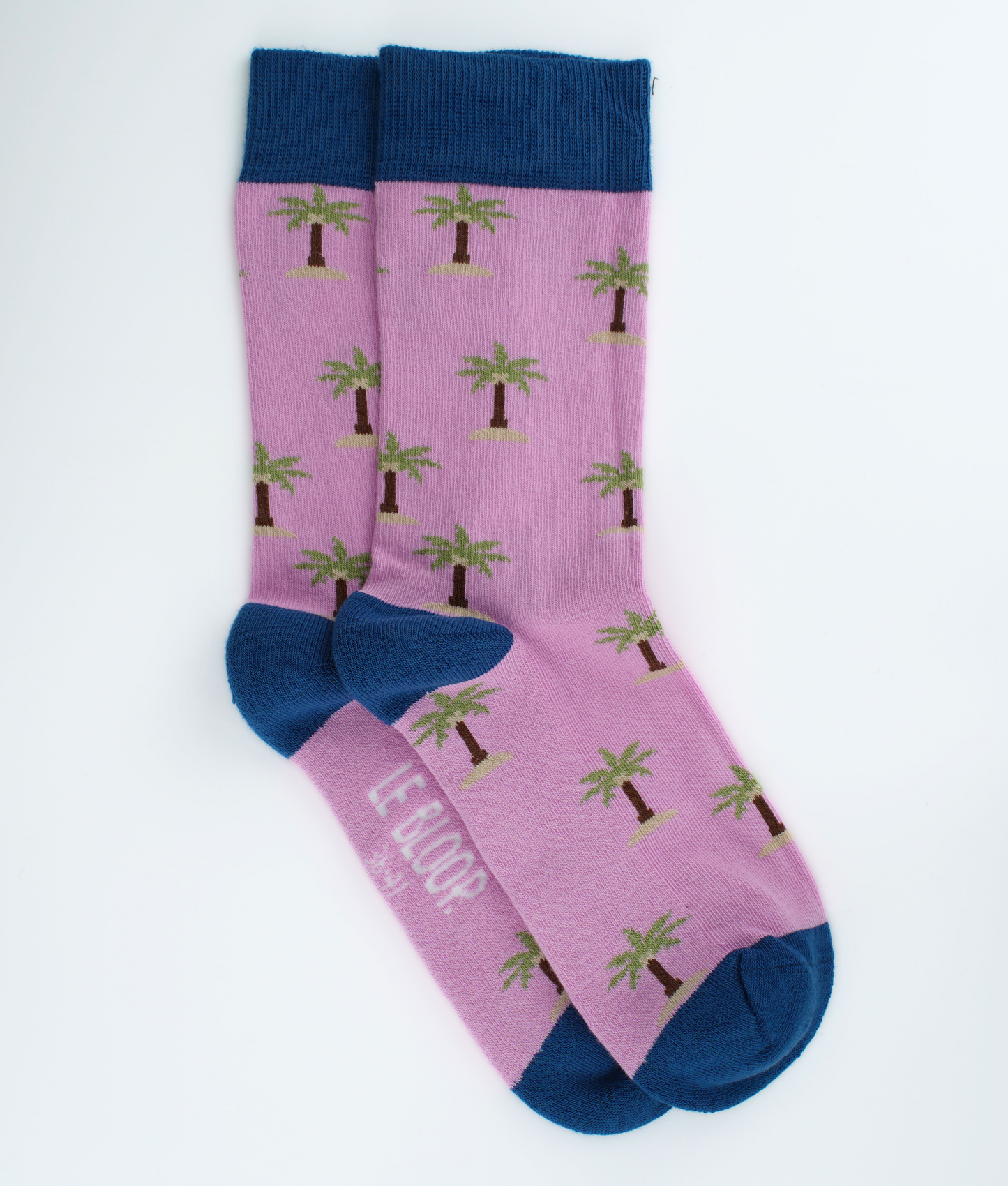 Chaussettes fantaisie en coton biologique bleu marine avec motif de palmiers roses