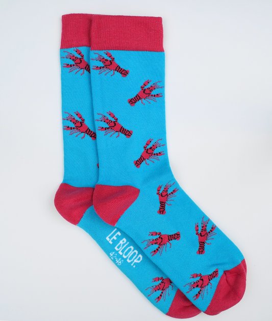 Chaussettes fantaisie en coton biologique bleues avec motif de homards rouges