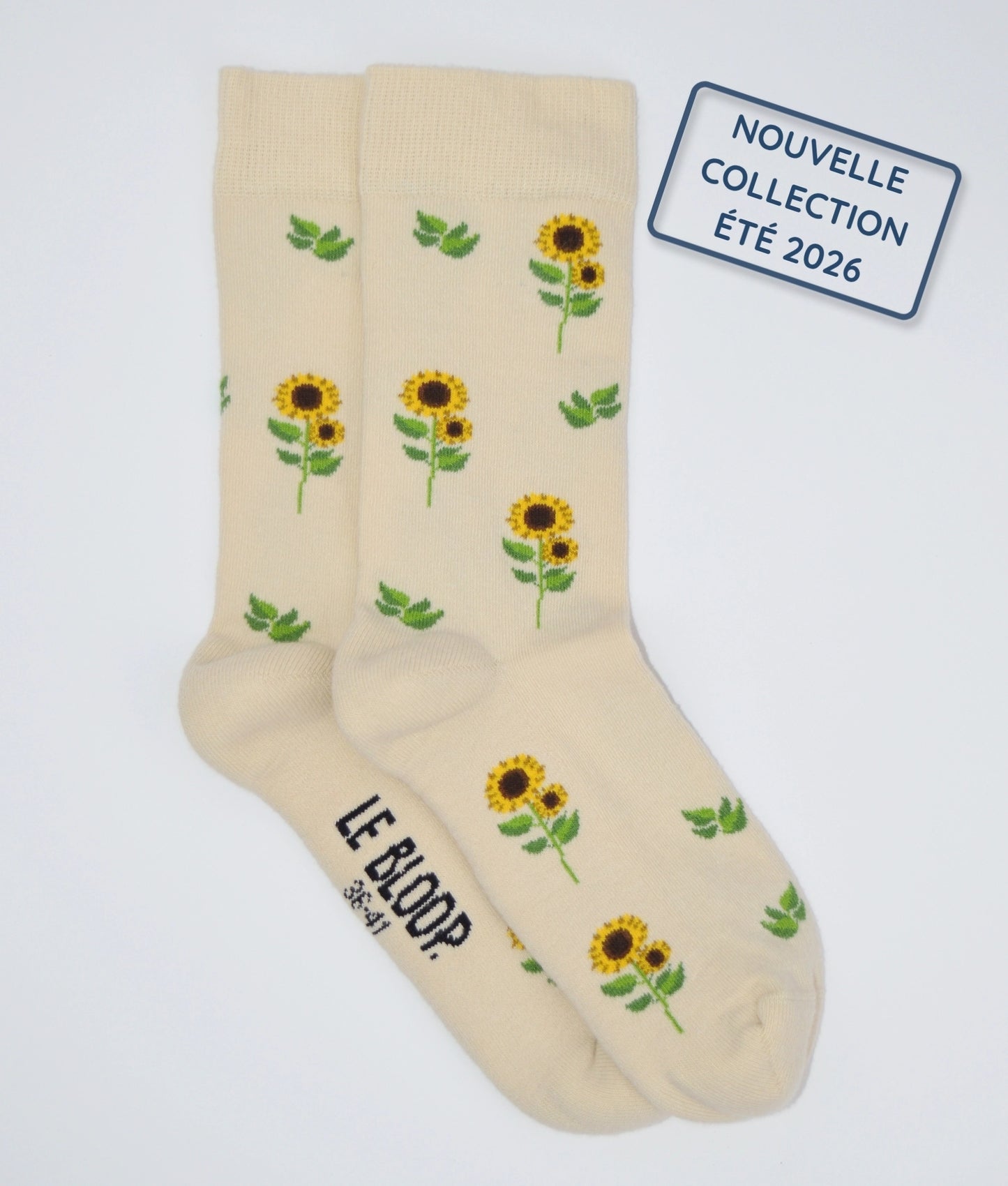 Chaussettes fantaisie crème et jaunes à motif tournesols, en coton biologique, fabriquées au Portugal, confortables et résistantes.