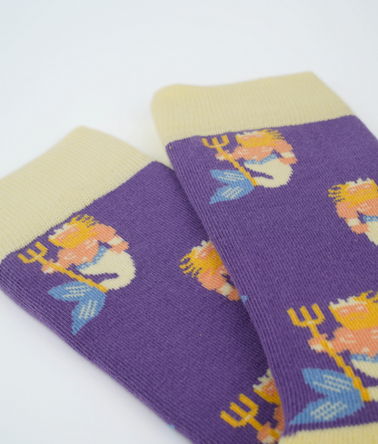 Chaussettes fantaisie en coton biologique jaunes avec motif de Poséidons tridents