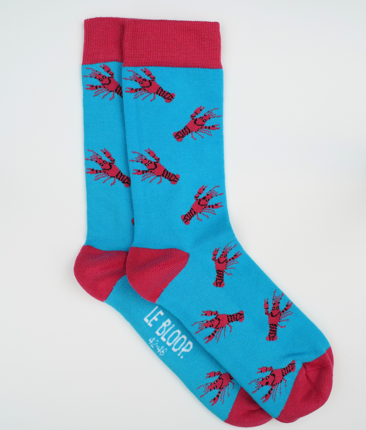 Chaussettes fantaisie en coton biologique bleues avec motif de homards rouges
