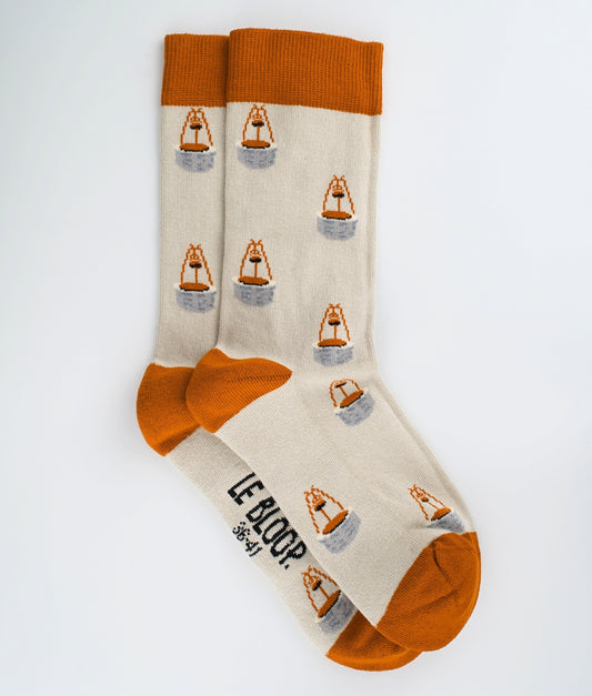 Chaussettes fantaisie à motif de puits. Tricotées en Europe en coton biologique, elles offrent confort, résistance et finitions plates sans couture.