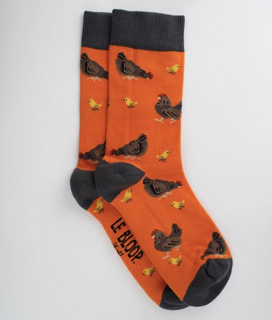 Chaussettes fantaisie en coton biologique orange avec motif de poules et poussins