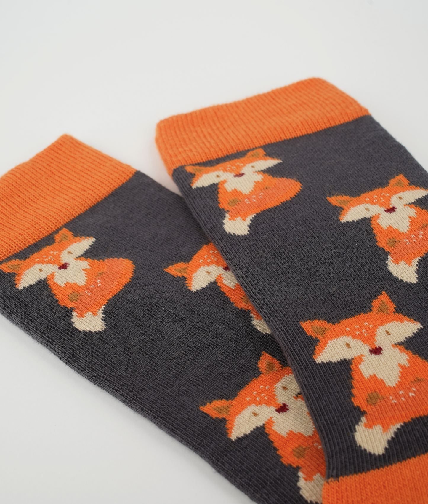 Chaussettes fantaisie en coton biologique orange avec motif de renards