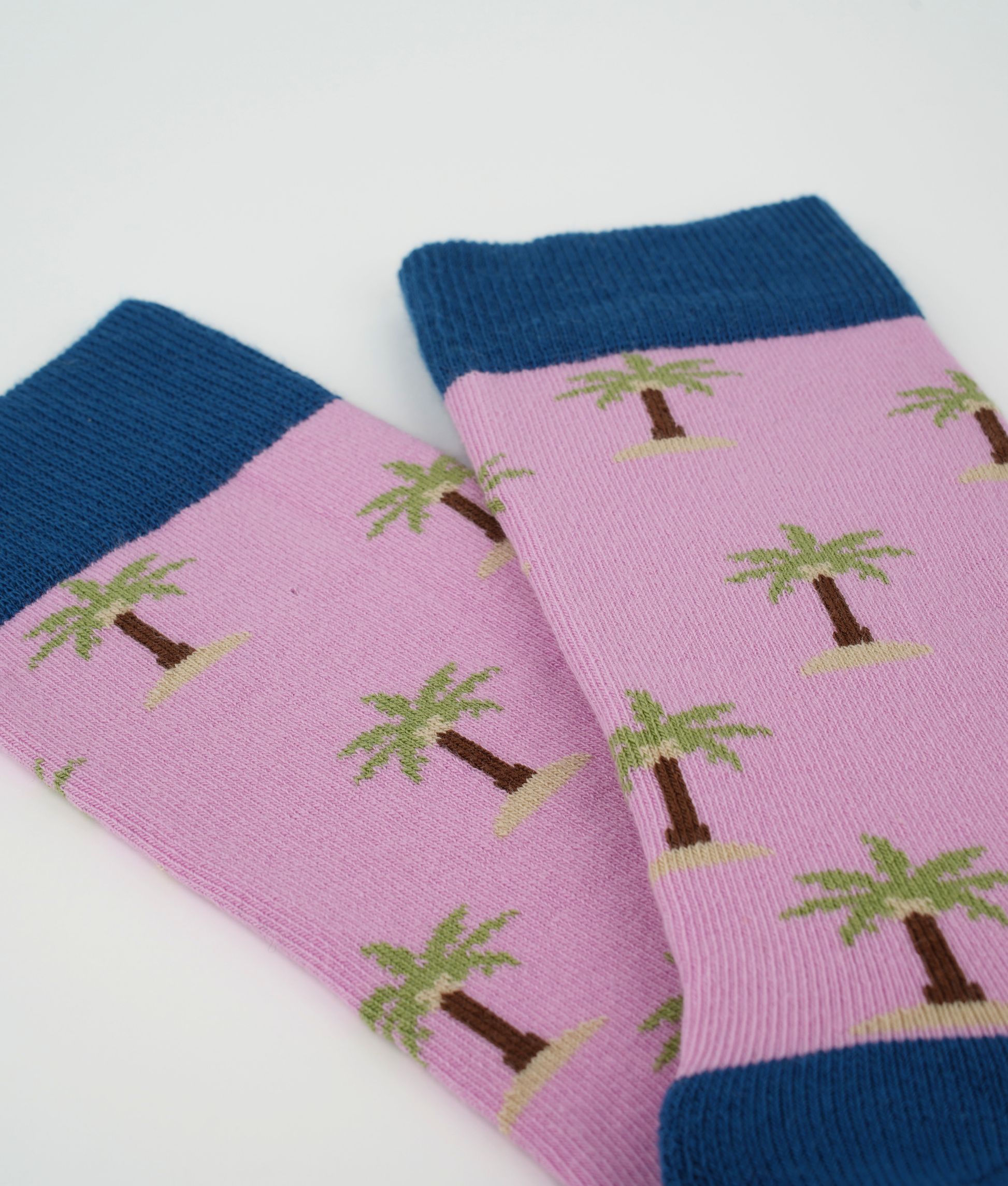 Chaussettes fantaisie en coton biologique roses avec motif de palmiers